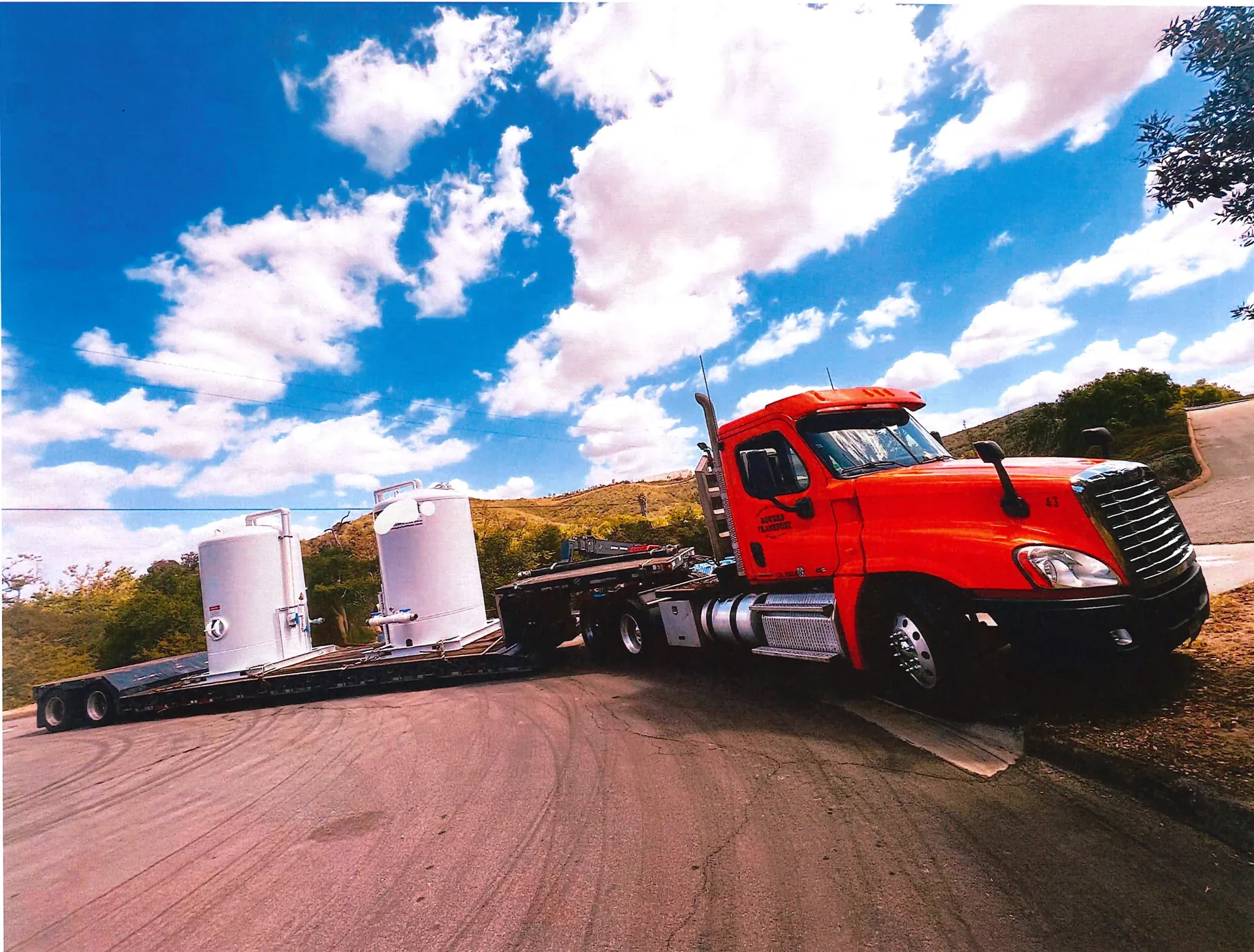 Bowers Transport truck carrying two industrial vessels